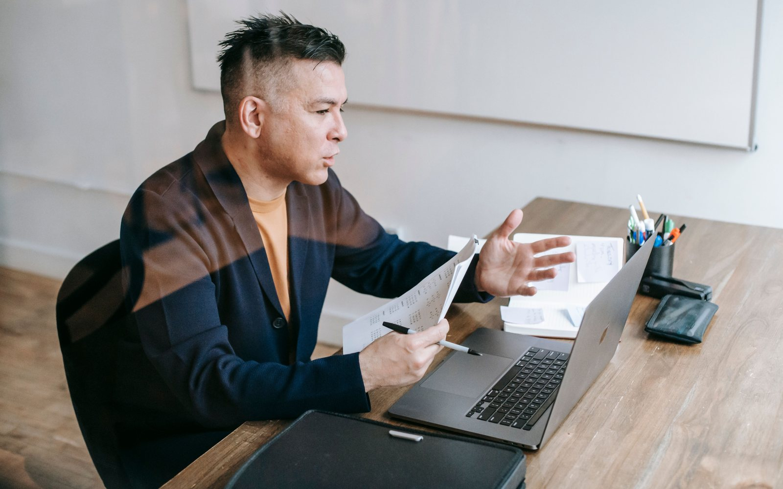 Business owner reviewing documents at a desk